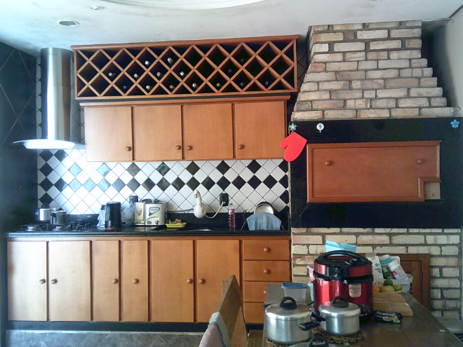 This is my kitchen here at the house where I live. It’s a kitchen in the back and it’s where I spend most of my time. So, I make a lot of recipes there, I’m always trying to make one thing or another.
- Mother participant, Pelotas