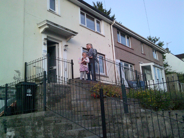 This is an outside view showing both of our houses. My mum’s on the left, and my Nan’s, soon to be ours, on the right. I remember going through her house with my mum and I was talking about what’s going to be our bedroom when we move in, and trying to decide where the bed would go. And my mum said, ironically, when I was born, that was the bedroom that I lived in with her. I used to sleep in my cot in that room with my mum. So I just found it poetic that I’m going right back to literally the first place that I lived.
- Participant, Bristol