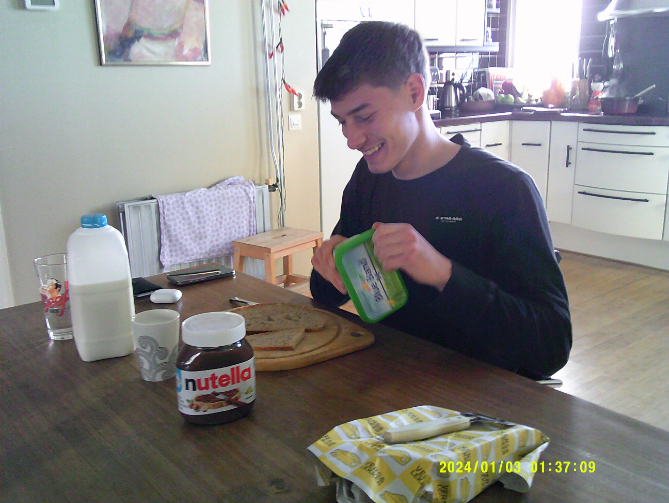 This is a photo of my son while we were eating breakfast together. I thought this was just a homely situation together at the breakfast table and that’s how it should be.
- Father participant, Rotterdam